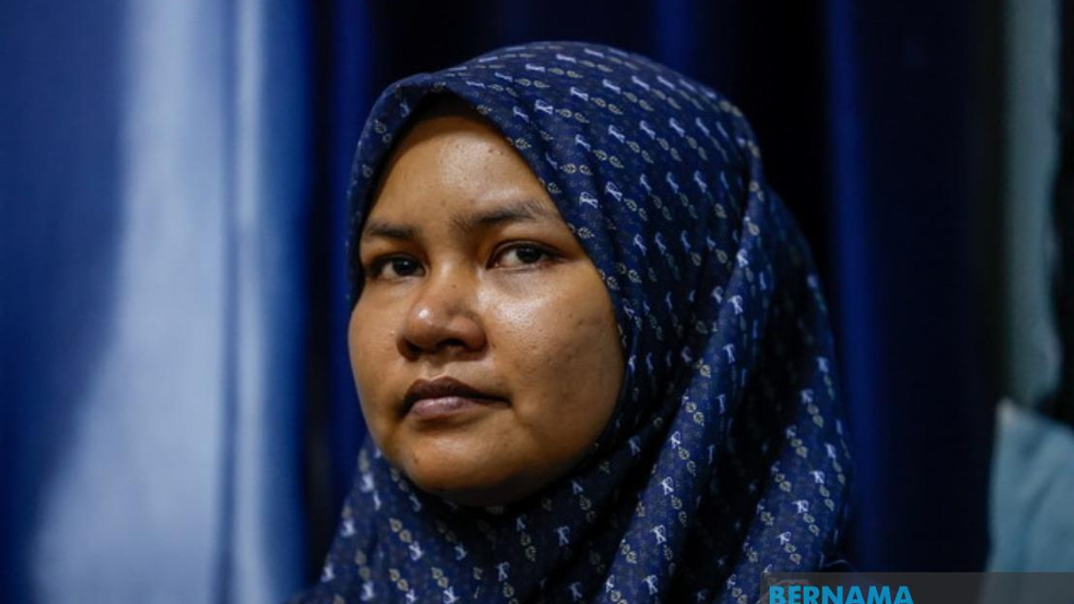 Widow of Slain Delivery Rider to Sue for RM1 Million Damages