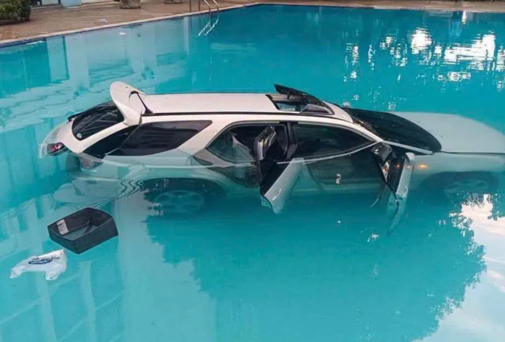 Thai man crashes SUV into university pool over rent dispute with mother