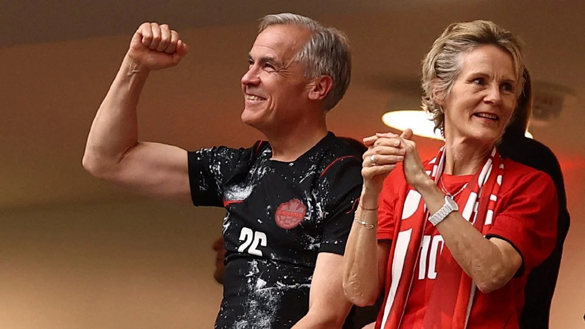 Carney celebrates Canada's maiden World Cup finals victory with squad visit