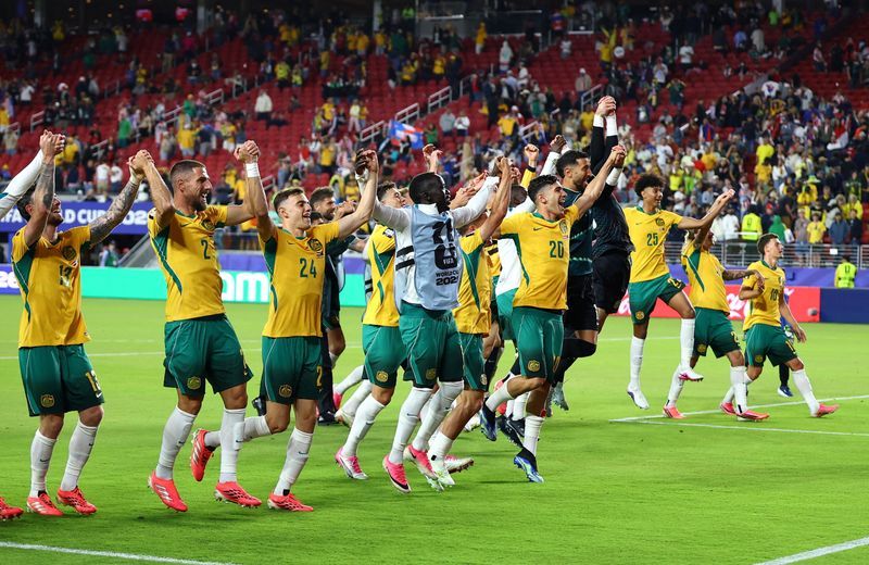 Australia advance to World Cup knockouts with Paraguay stalemate