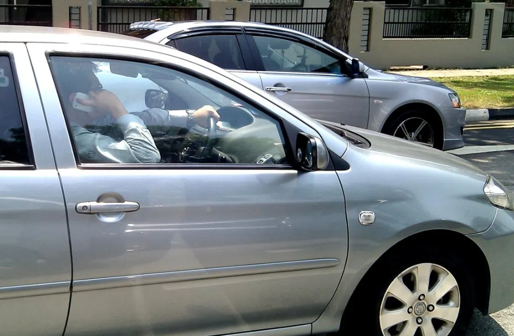 Singapore to Ban Holding Phones While Driving, Toughen Penalties for Reckless Motorists