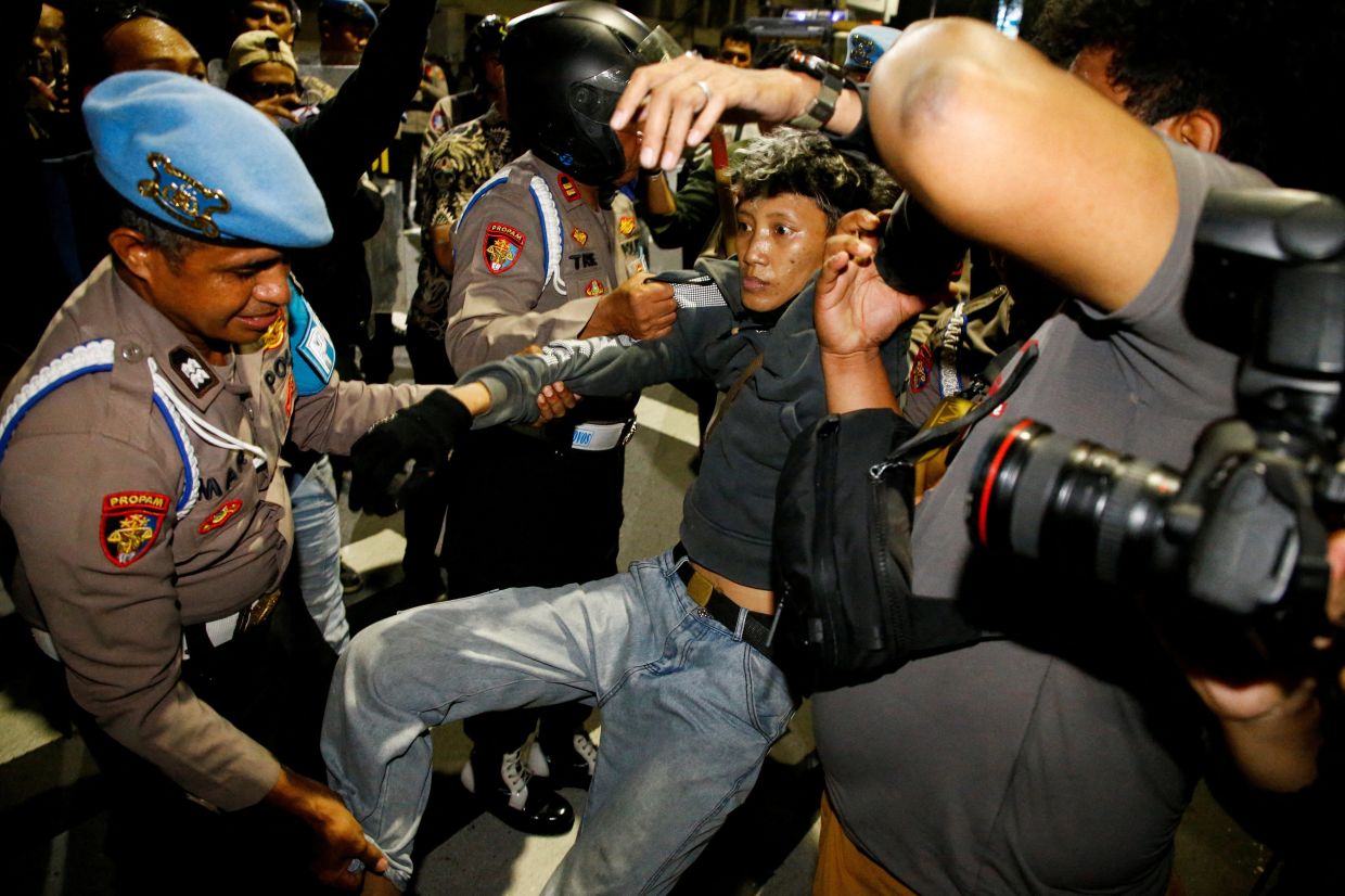 Indonesia charges four protesters after Surabaya fuel price demonstration